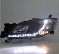 035 Đèn bi xenon Mazda 3 nguyên cụm